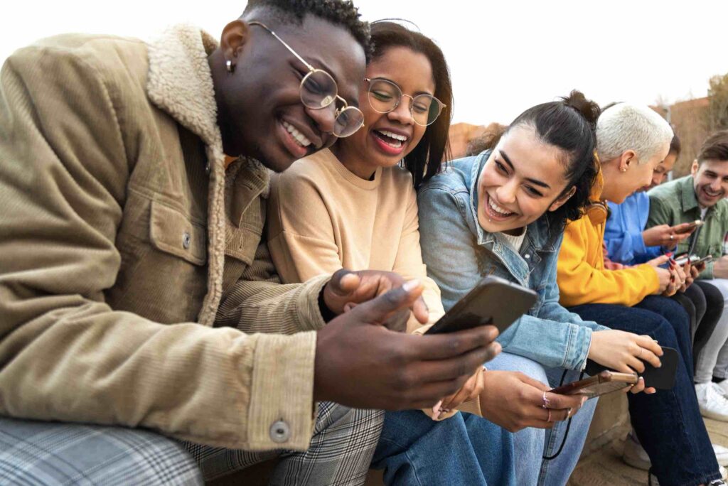 A person holding a smartphone running the GlobalHealth AI App